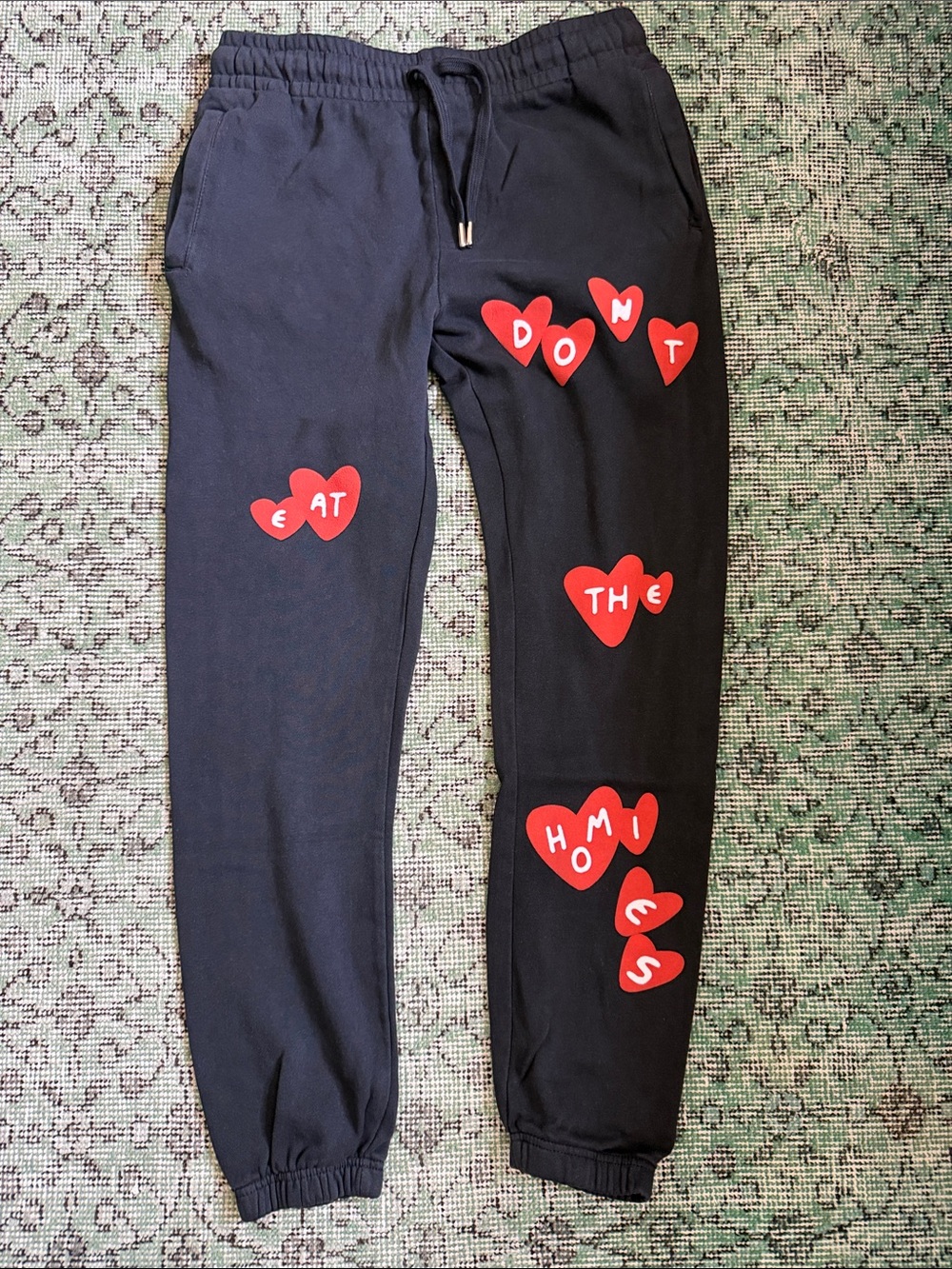 Don’t Eat The Homies Black Sweatpants with Red Heart Graphic